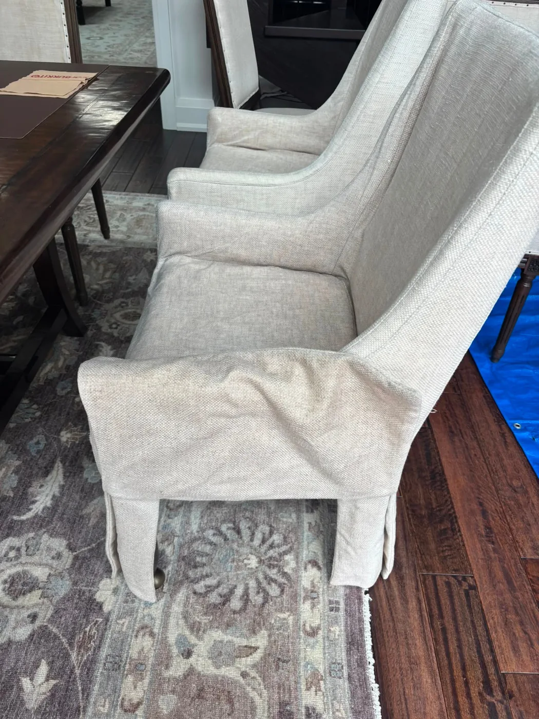 Cream upholstered dining armchairs